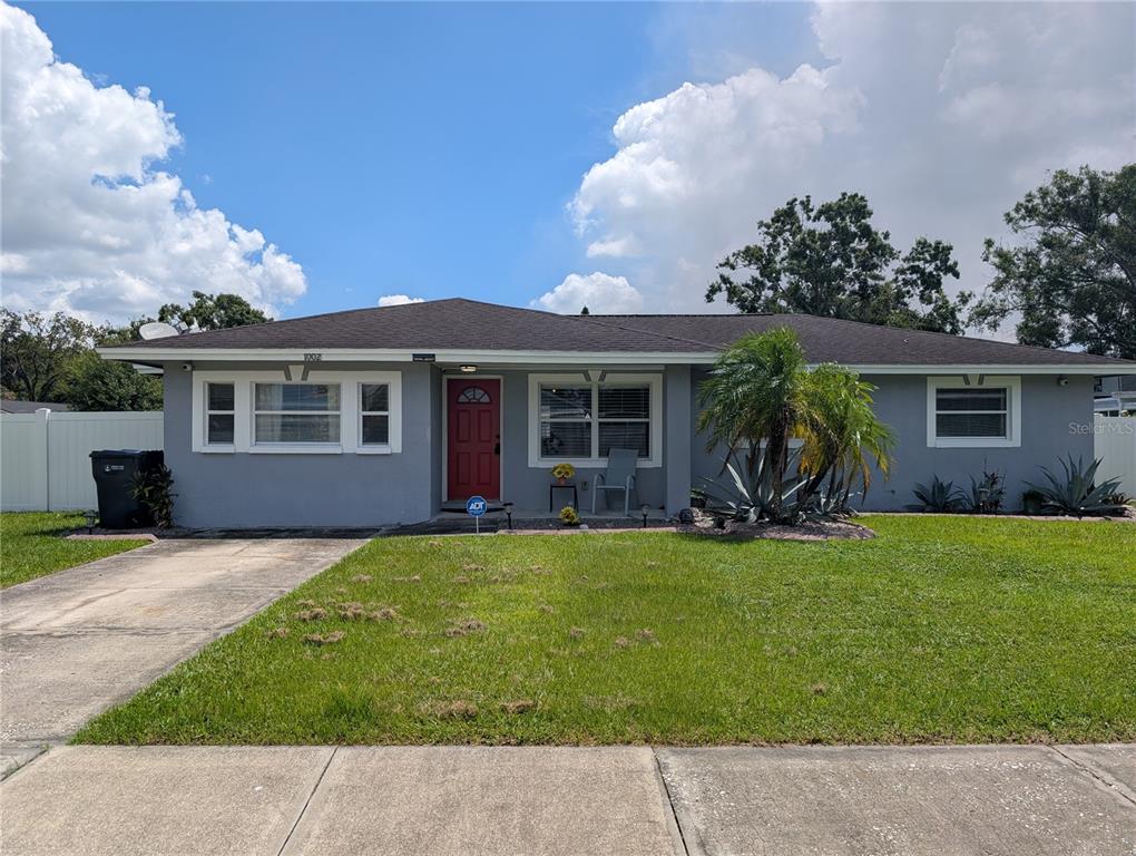 front view of a house with a patio
