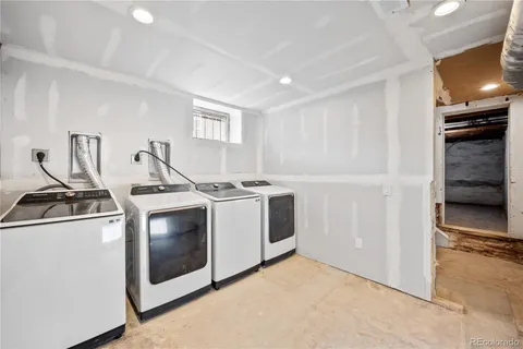 a kitchen with a stove and a microwave