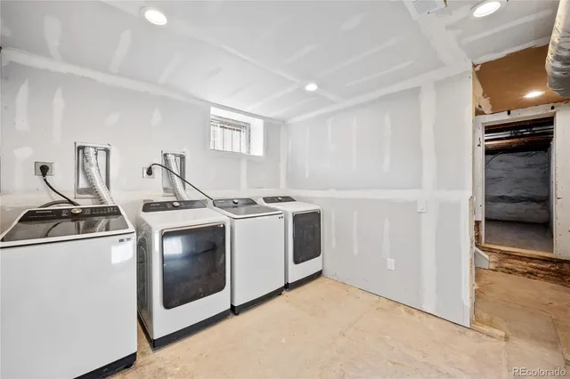 a kitchen with a stove and a microwave