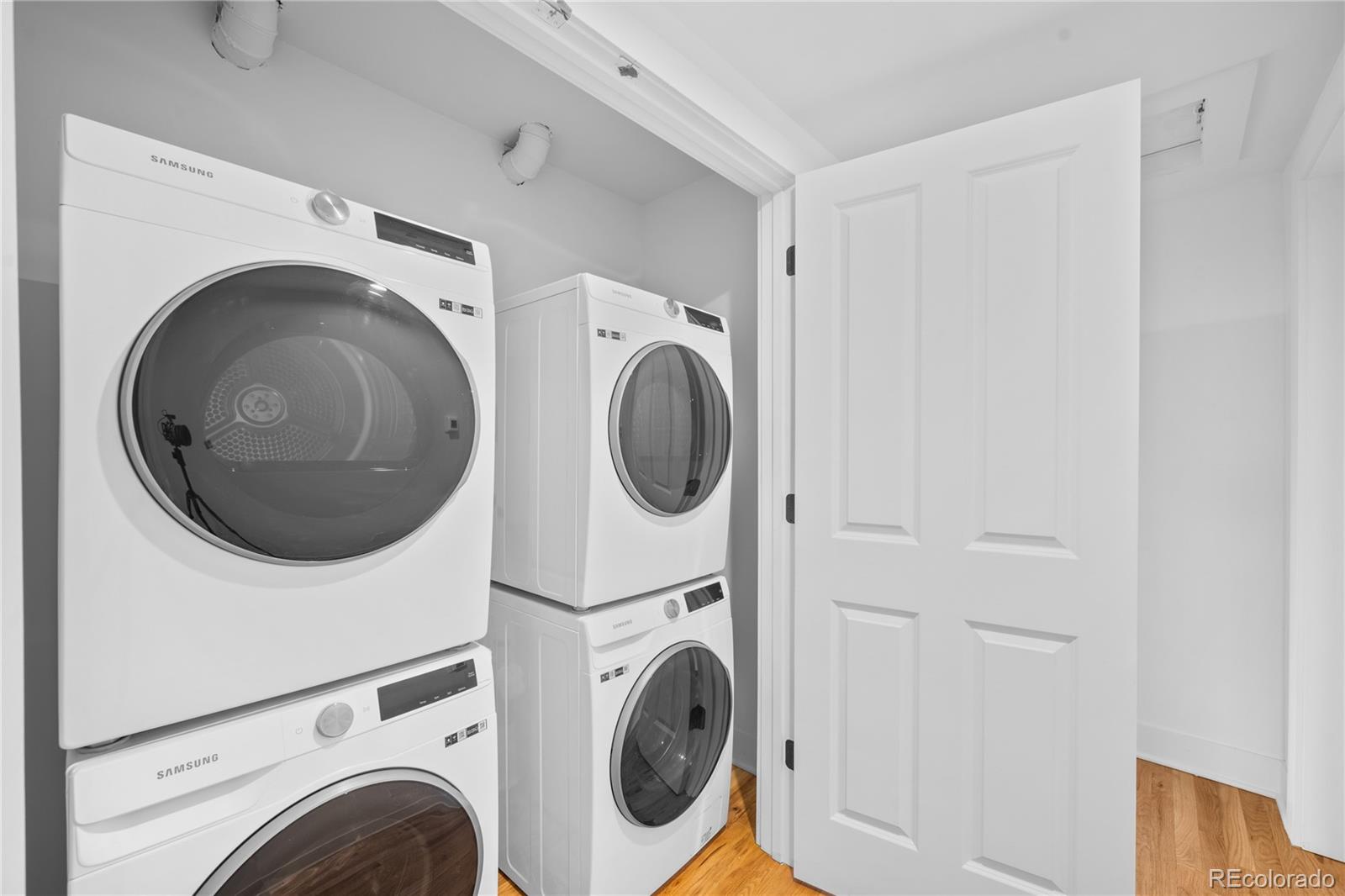 1442-1444 Stuart Street Denver, CO 80204 - Photo 22 of 26 a utility room with dryer and washer