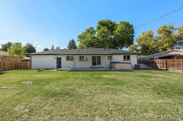 an aerial view of residential house with outdoor space