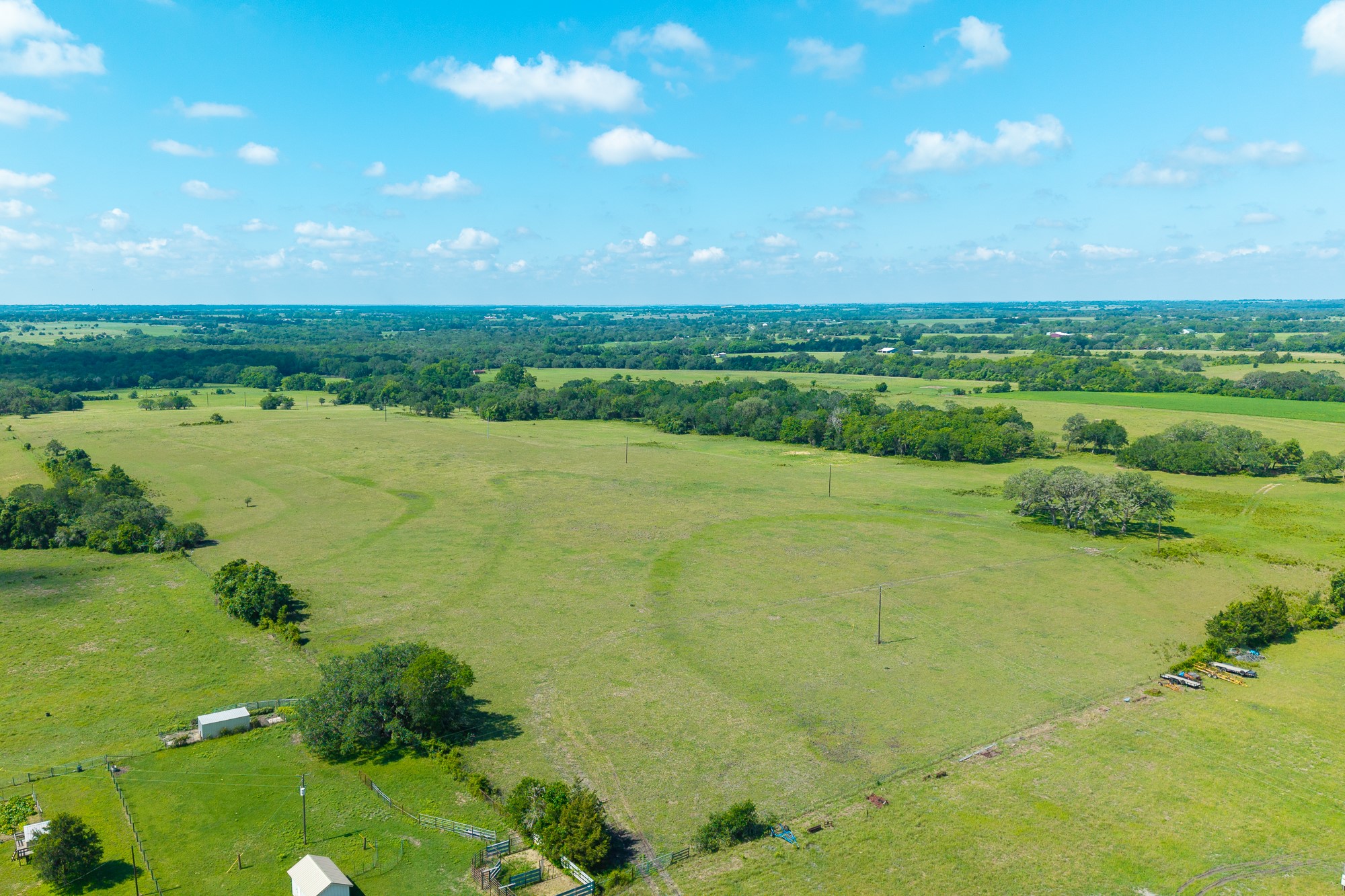 5018 Wolters Road Schulenburg, TX 78956 - Photo 5 of 39 a view of a lake with a yard