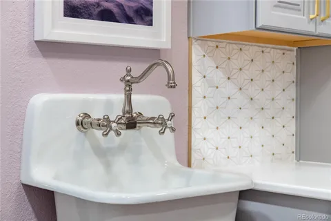 a spacious bedroom with a bed and a window