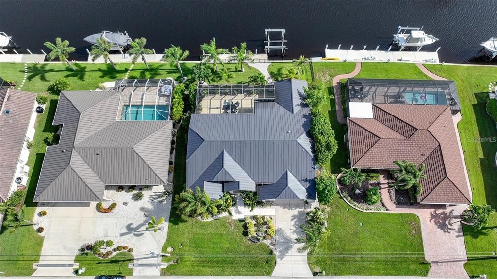 822 Vía Formia Punta Gorda, FL 33950 - Photo 27 of 33 an aerial view of a house with a swimming pool