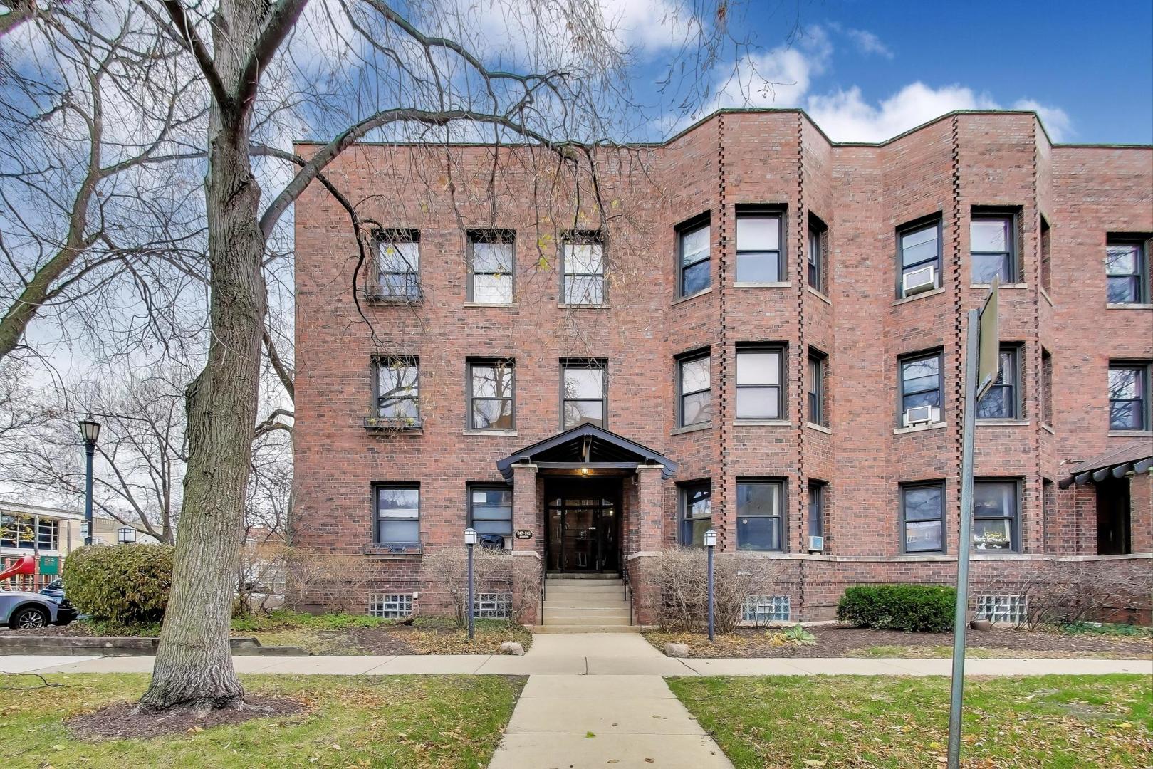 847 Judson Avenue, Unit 2 Evanston, IL 60202 - Photo 1 of 19 a front view of a building with garden