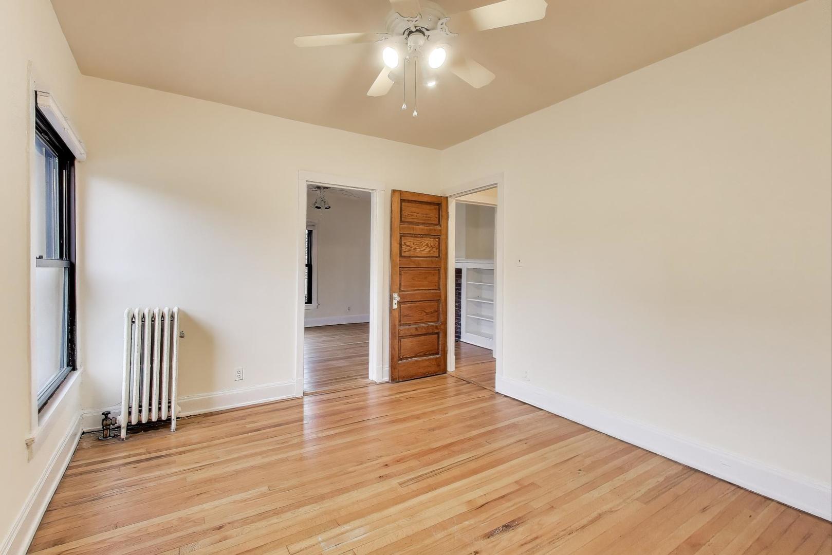 847 Judson Avenue, Unit 2 Evanston, IL 60202 - Photo 6 of 19 a view of empty room with wooden floor