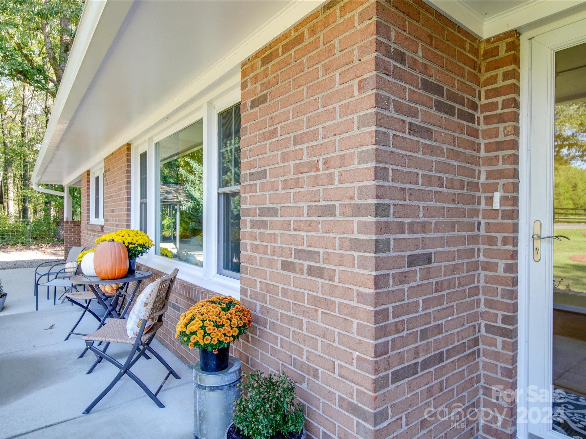 4904 Bud Wilson Road Gastonia, NC 28056 - Photo 7 of 45 a outdoor space with chairs