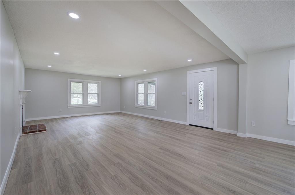4604 Highway 151 LaFayette, GA 30728 - Photo 10 of 30 a view of an empty room with wooden floor and window