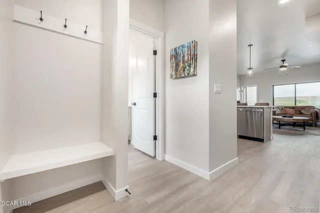 a spacious bedroom with a bed and a window