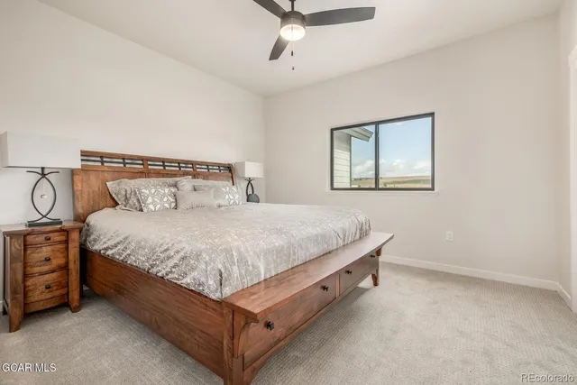 a bathroom with a double vanity sink and mirror