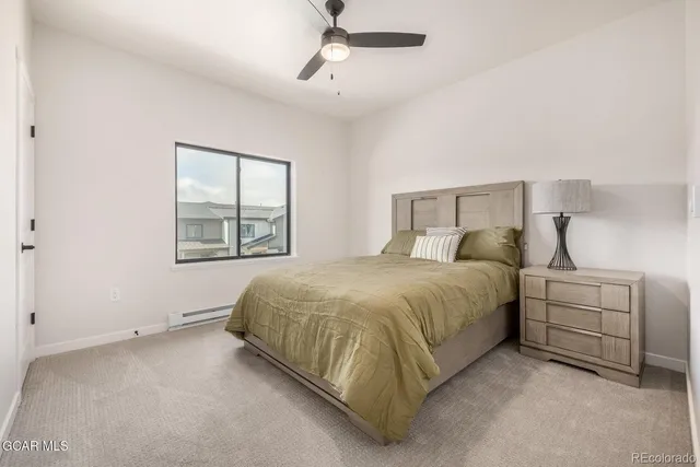a view of a chair and tables in the patio