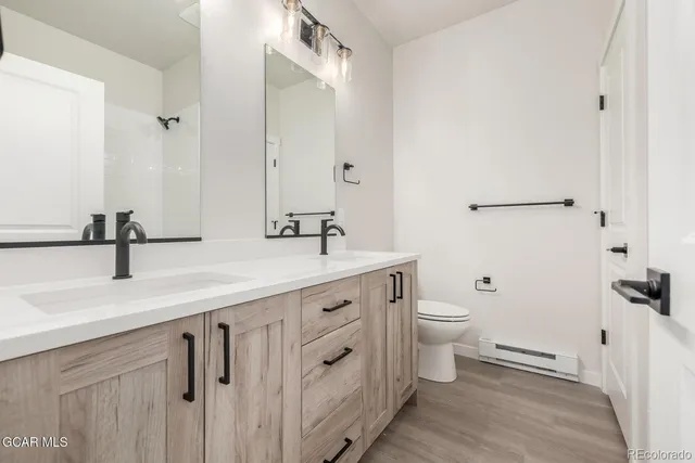 a front view of a house with a empty space