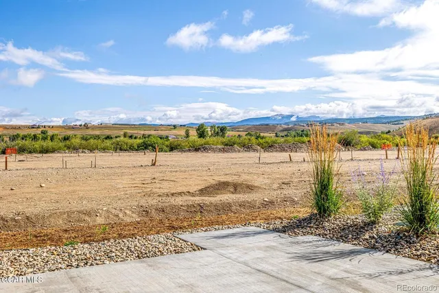 a view of a table and chairs in patio