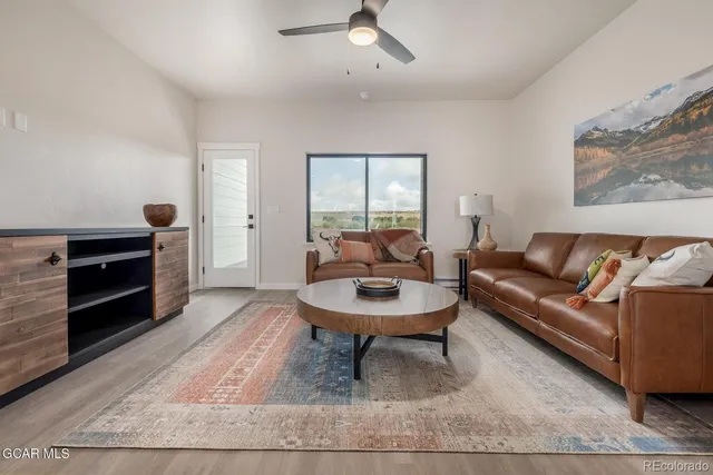 a view of a kitchen and dining room