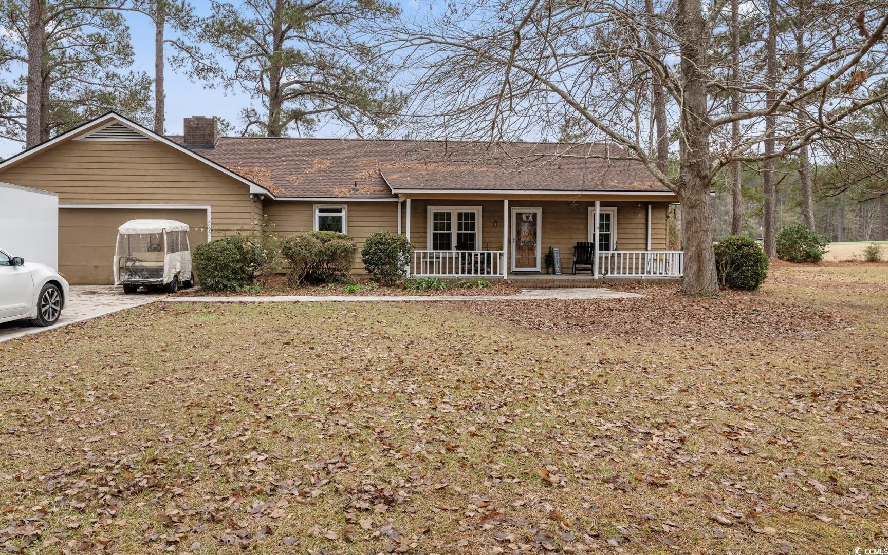 291 Francis Parker Road Georgetown, SC 29440 - Photo 1 of 28 Ranch-style house featuring a chimney, covered por