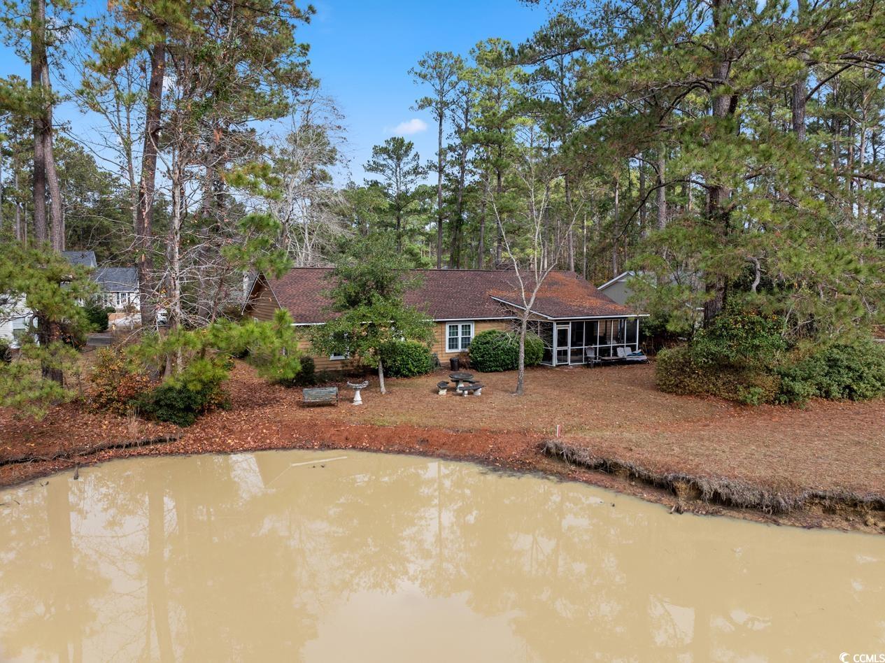 291 Francis Parker Road Georgetown, SC 29440 - Photo 27 of 28 Back of property featuring a sunroom, a water view