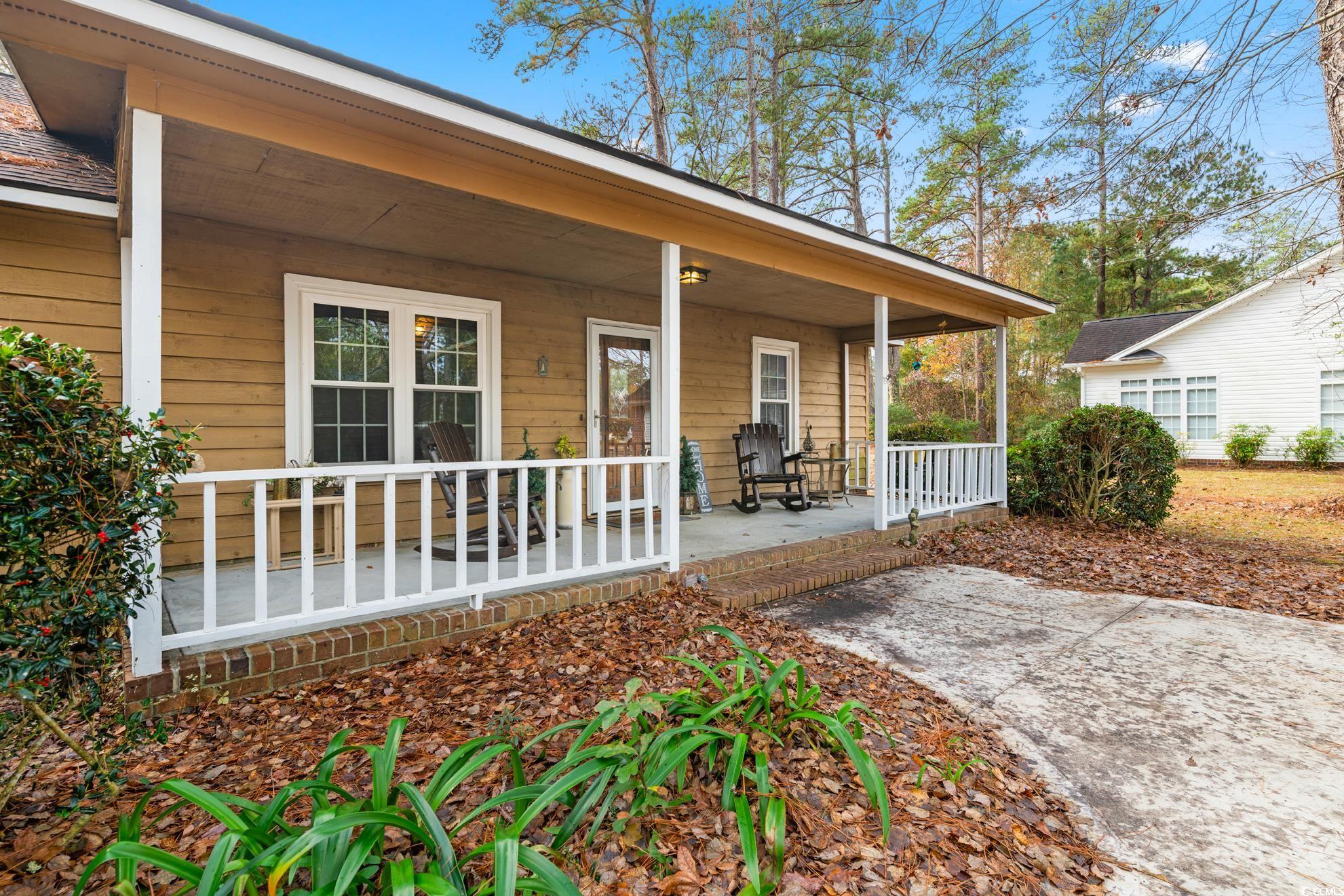 291 Francis Parker Road Georgetown, SC 29440 - Photo 4 of 28 Back of house featuring a porch