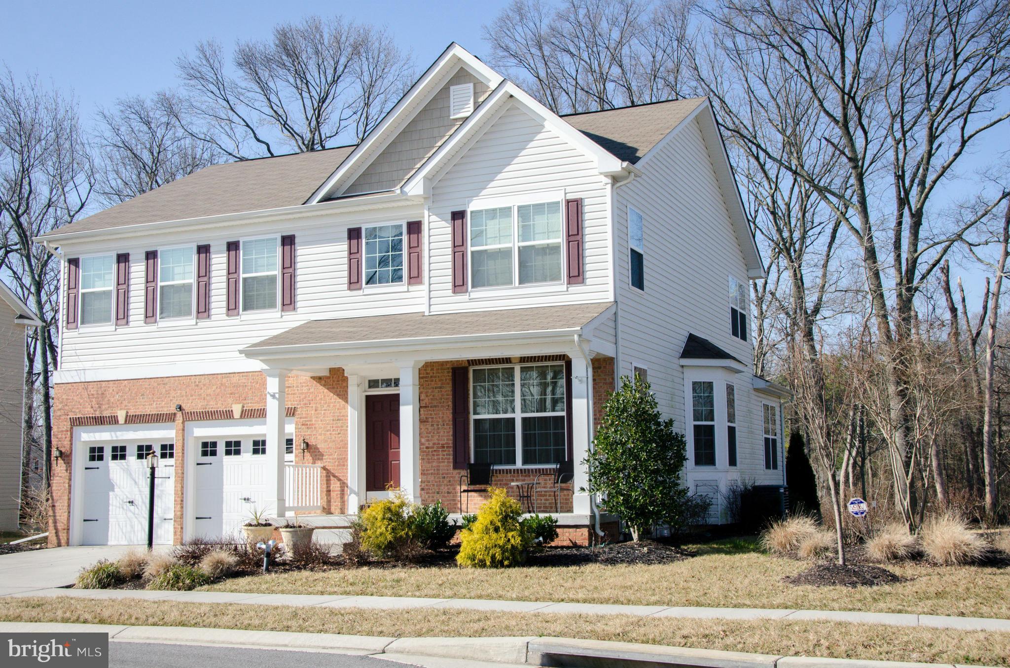 826 Salvatore Road Baltimore, MD 21220 - Photo 1 of 30 a front view of a house with a yard