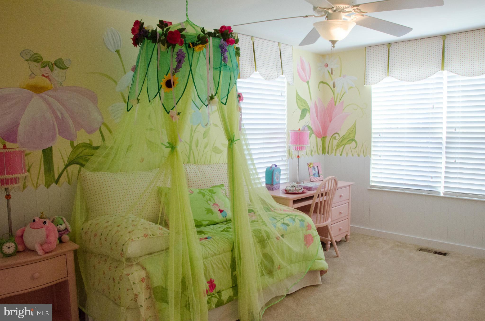 826 Salvatore Road Baltimore, MD 21220 - Photo 16 of 30 a view of a bedroom with a bed and toys