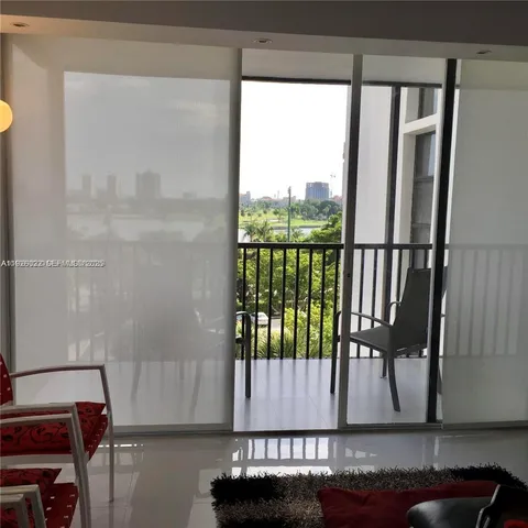 a view of a balcony with a chair