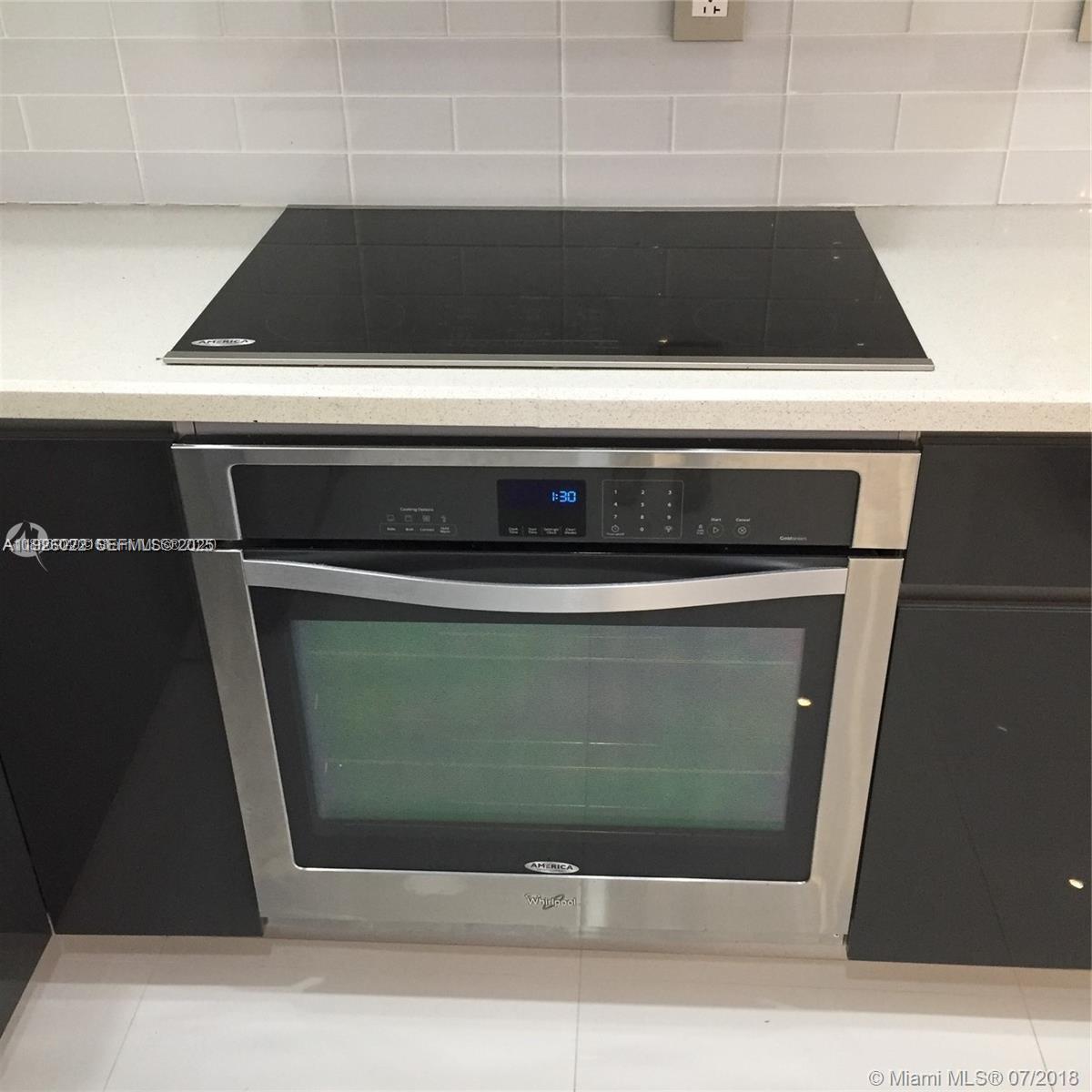 3731 North Country Club Drive, Unit 623 Aventura, FL 33180 - Photo 3 of 30 a close view of stove