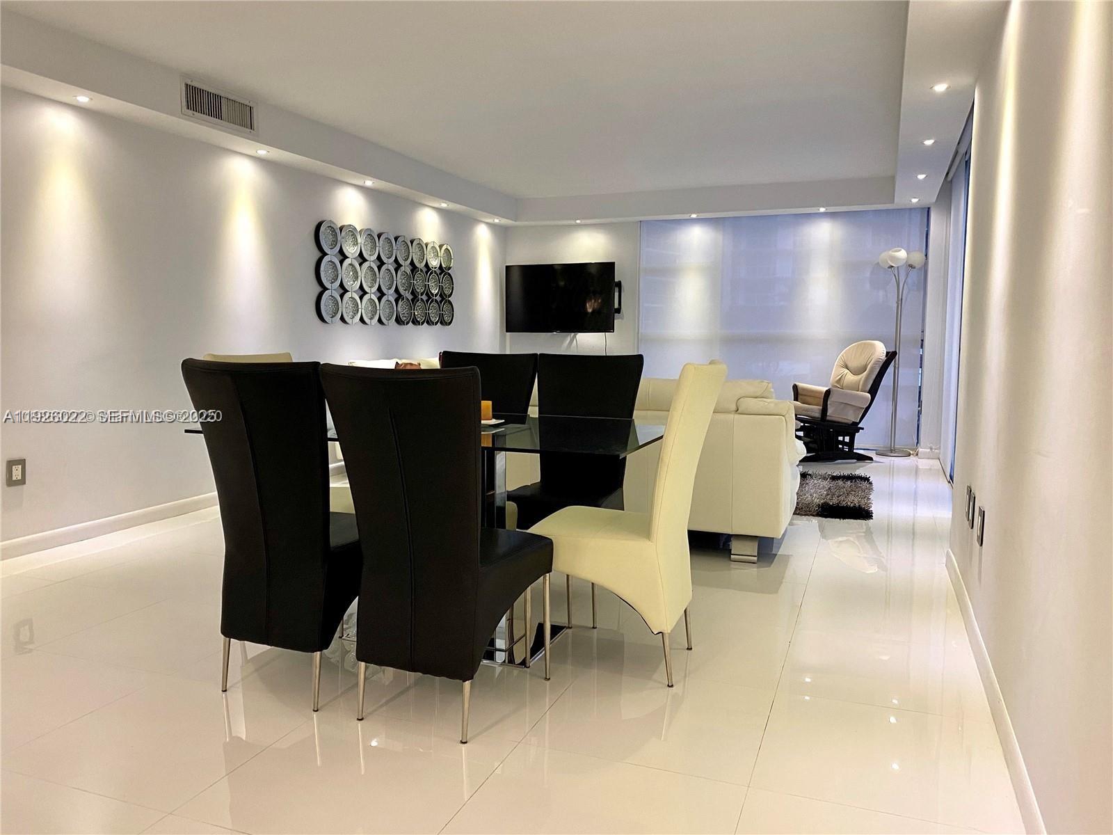 3731 North Country Club Drive, Unit 623 Aventura, FL 33180 - Photo 9 of 30 a living room with furniture