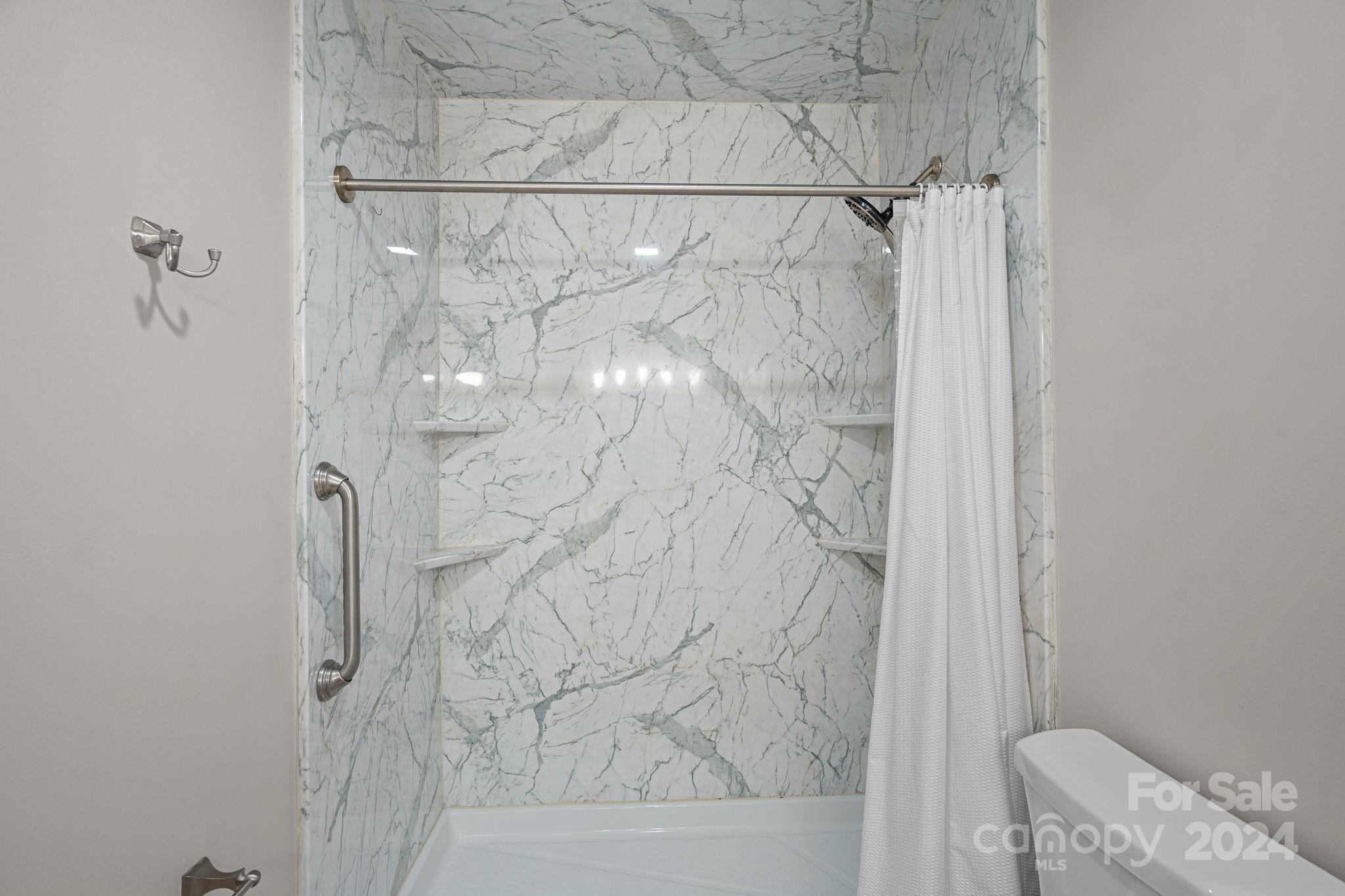 7505 Sarah Drive Denver, NC 28037 - Photo 21 of 34 a bathroom with a shower