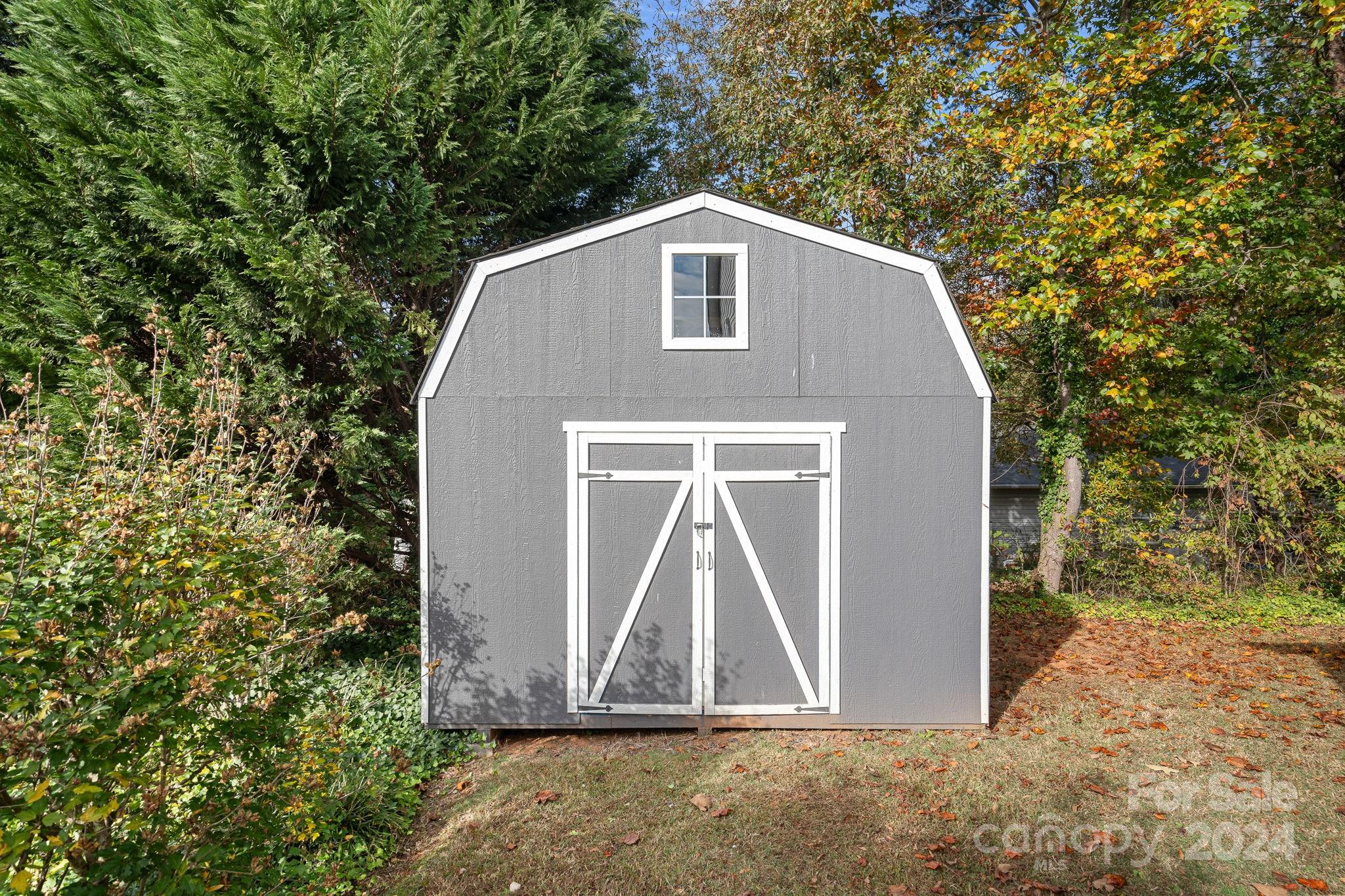 7505 Sarah Drive Denver, NC 28037 - Photo 27 of 34 a front view of a house with a yard