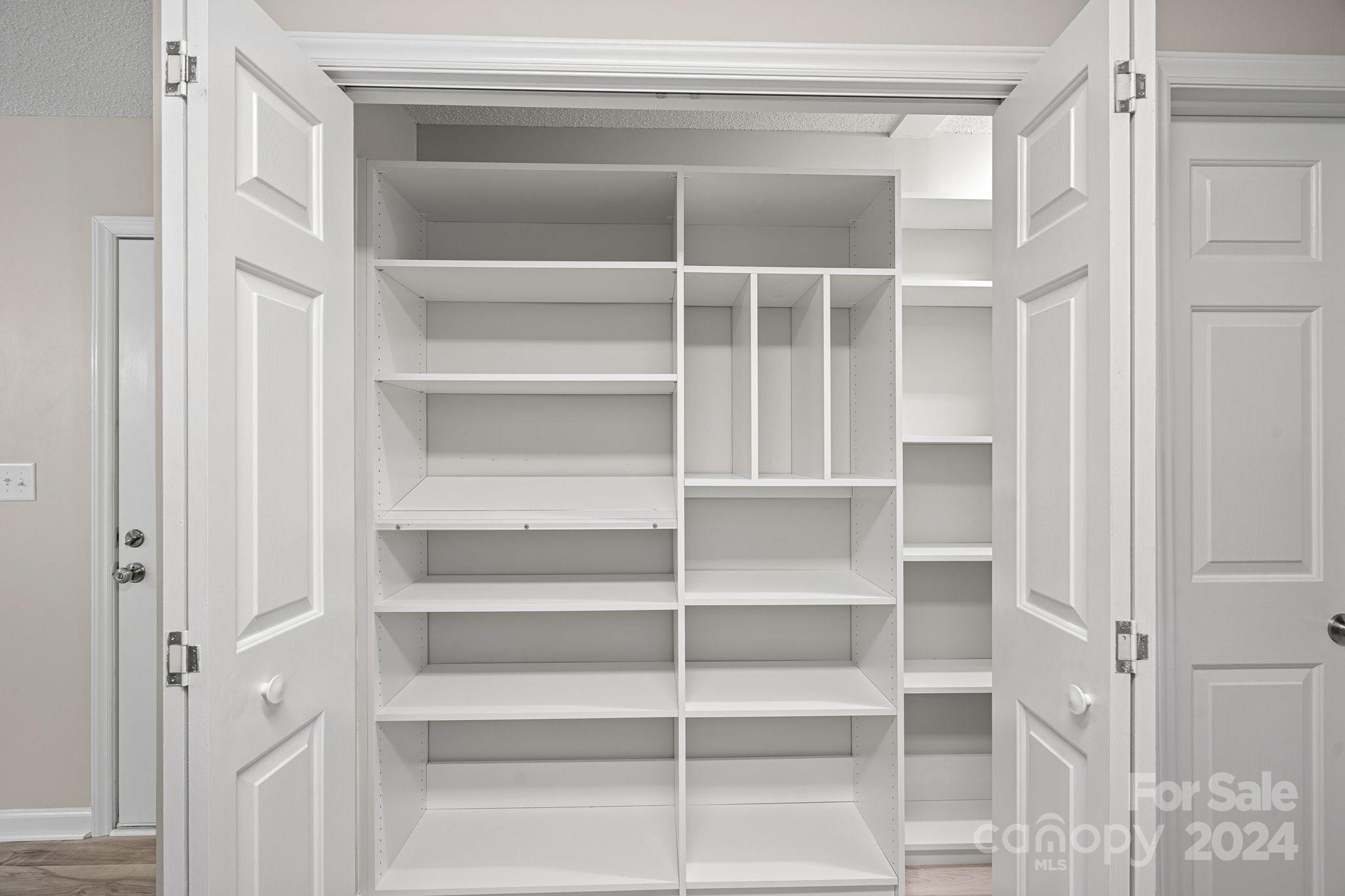 7505 Sarah Drive Denver, NC 28037 - Photo 10 of 34 a view of an empty walk in closet