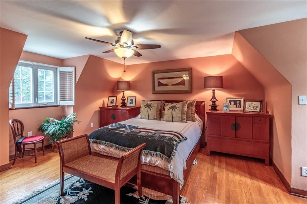 3239 Comanche Road Pittsburgh, PA 15241 - Photo 17 of 25 a bedroom with a bed and a chandelier