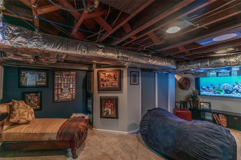 3239 Comanche Road Pittsburgh, PA 15241 - Photo 19 of 25 a bed room with a bed and a tv