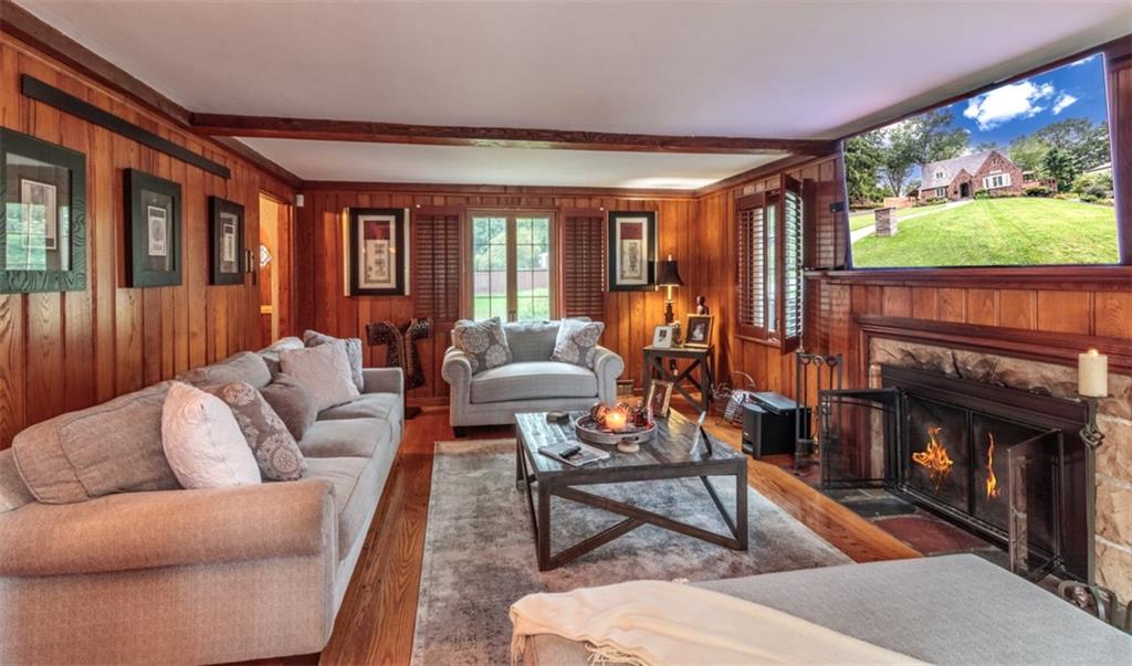 3239 Comanche Road Pittsburgh, PA 15241 - Photo 4 of 25 a living room with furniture a floor to ceiling window and outdoor view
