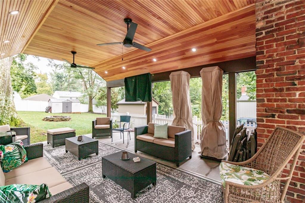 3239 Comanche Road Pittsburgh, PA 15241 - Photo 5 of 25 a living room with patio furniture and a floor to ceiling window