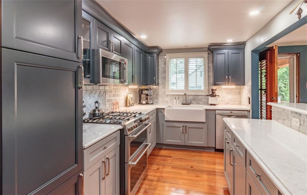 3239 Comanche Road Pittsburgh, PA 15241 - Photo 9 of 25 a kitchen with a sink stove and refrigerator