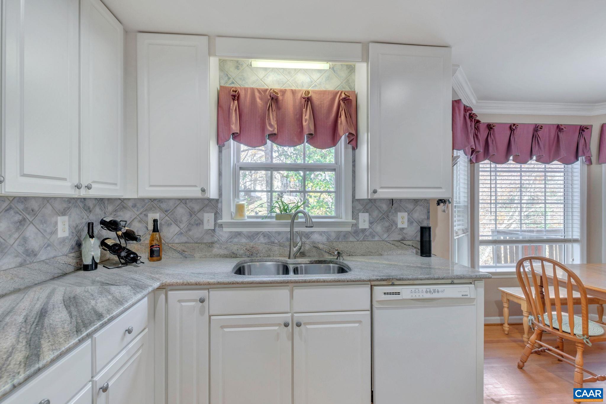 1642 Old Brook Road Charlottesville, VA 22901 - Photo 13 of 42 a kitchen with a sink cabinets and window