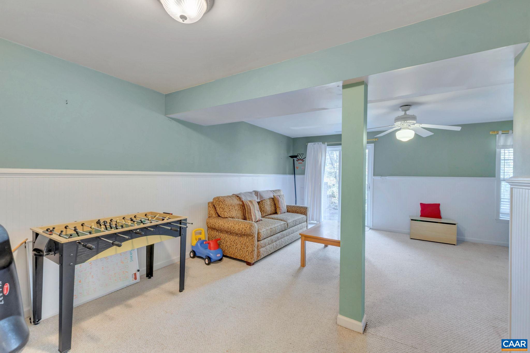 1642 Old Brook Road Charlottesville, VA 22901 - Photo 30 of 42 a living room with furniture and a mirror