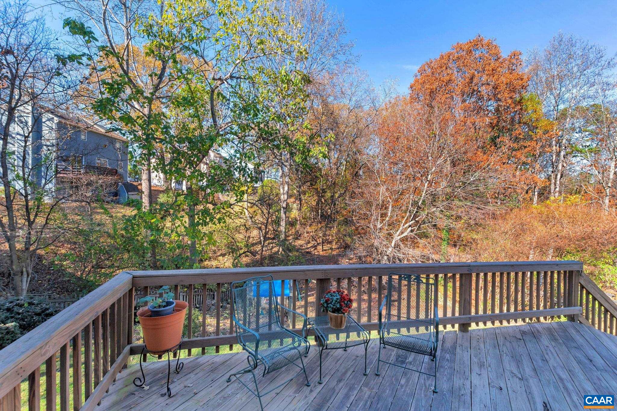 1642 Old Brook Road Charlottesville, VA 22901 - Photo 35 of 42 a balcony with wooden floor and outdoor seating