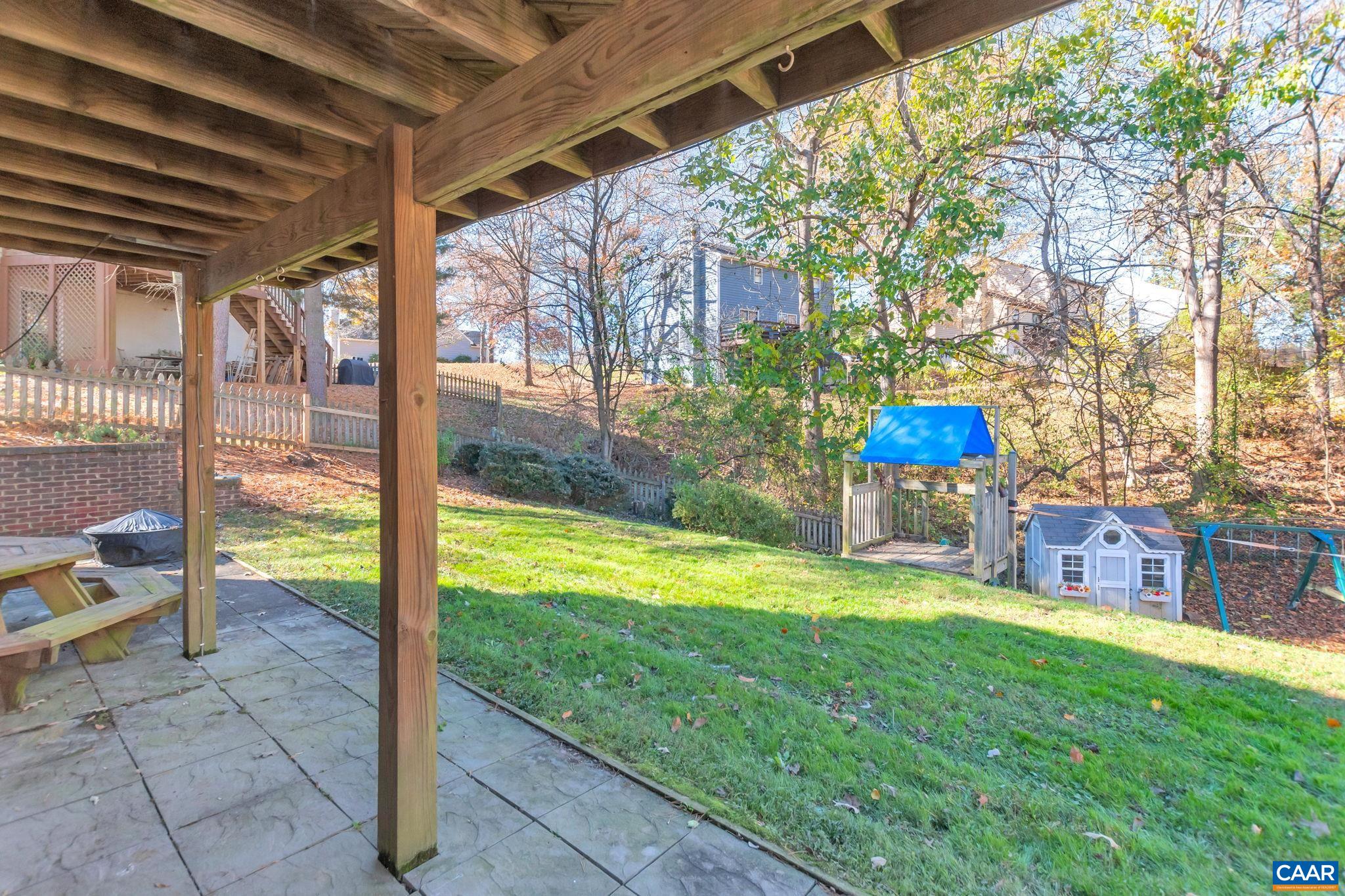 1642 Old Brook Road Charlottesville, VA 22901 - Photo 36 of 42 a view of a porch with a yard