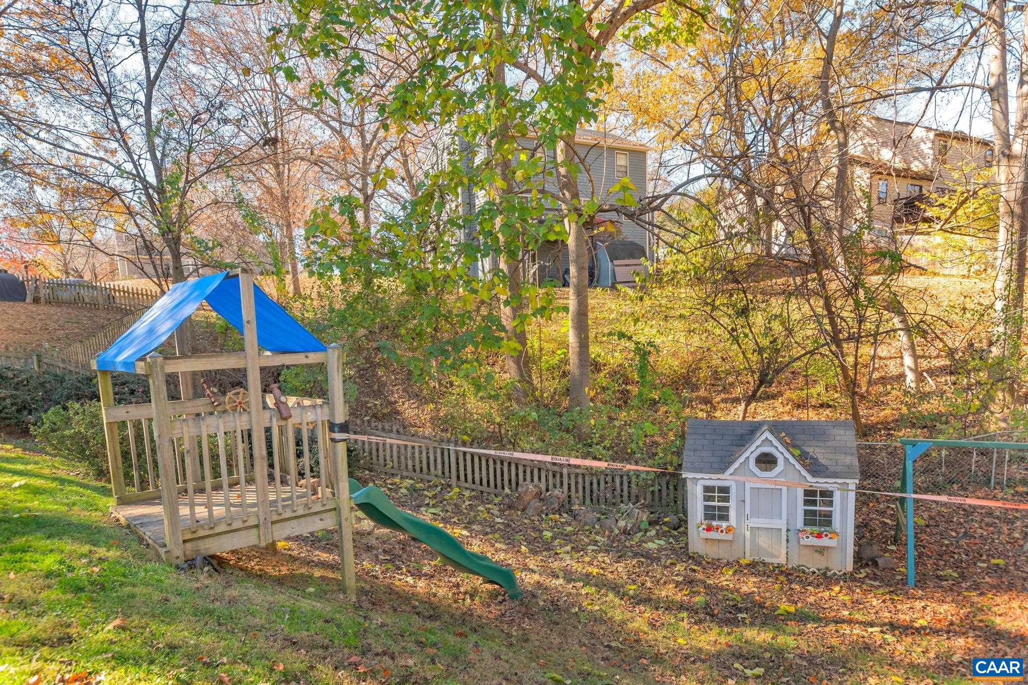 1642 Old Brook Road Charlottesville, VA 22901 - Photo 40 of 42 a view of a house with a yard in a forest