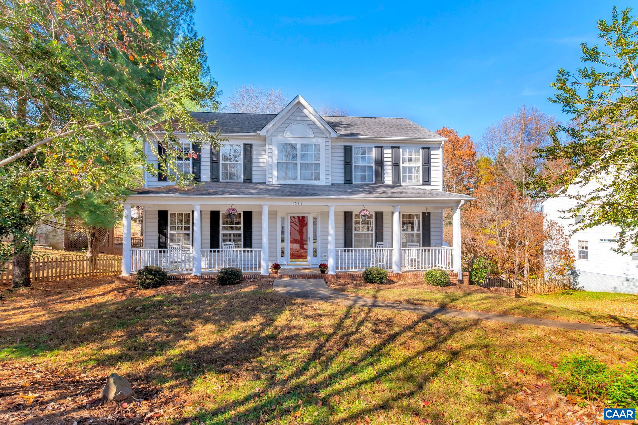 1642 Old Brook Road Charlottesville, VA 22901 - Photo 41 of 42 a front view of a building with a garden