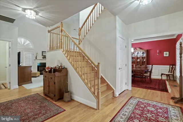 a view of entryway livingroom and hall