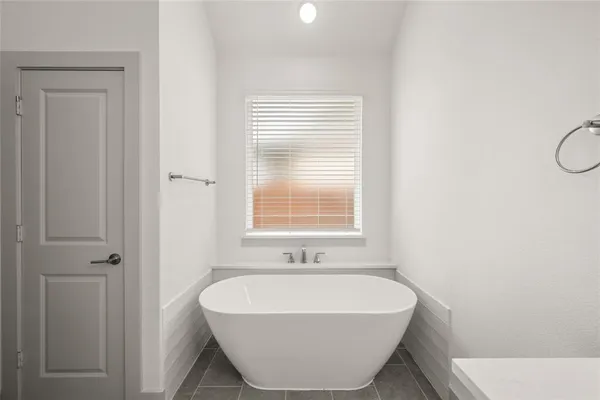 a bathroom with a sink and a bathtub