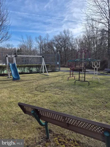 a view of an ocean and a yard