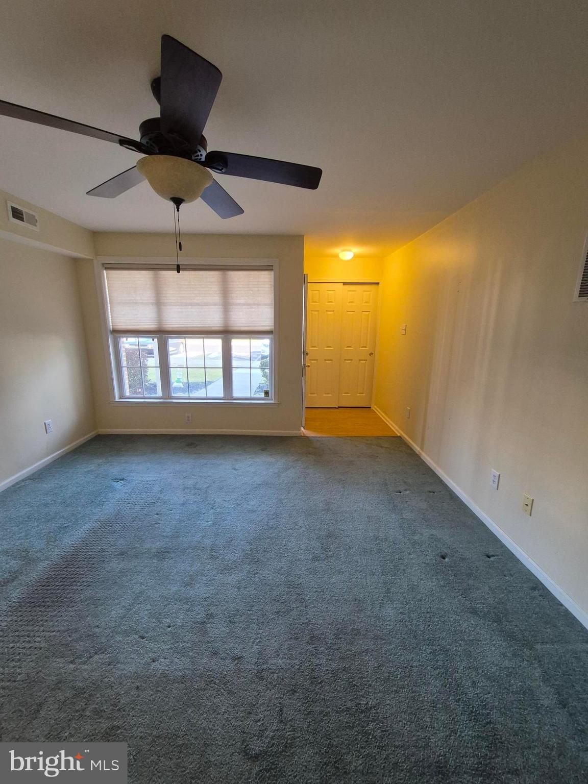 1782 Gibson Road Bensalem, PA 19020 - Photo 6 of 33 an empty room with a empty space and windows