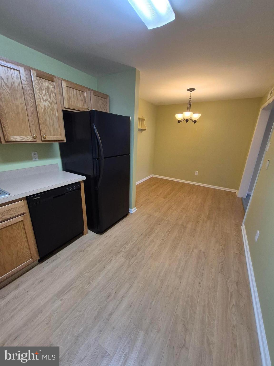 1782 Gibson Road Bensalem, PA 19020 - Photo 10 of 33 a kitchen with cabinets and wooden floor