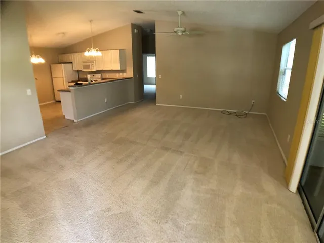 a view of a kitchen with a sink