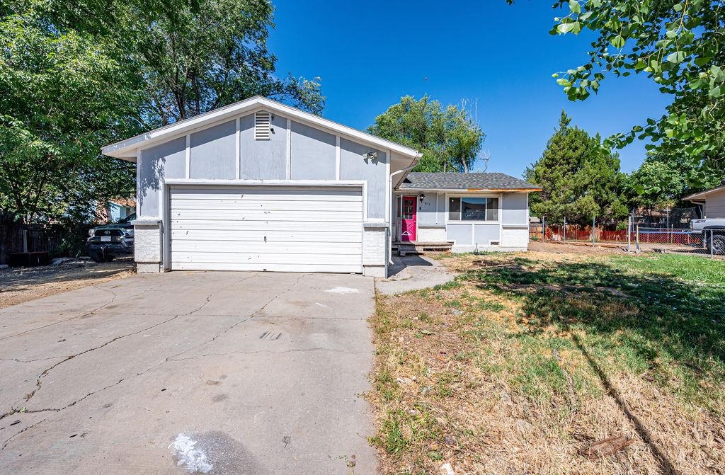 631-29 29 1/4 Road Grand Junction, CO 81504 - Photo 1 of 11 a view of a house with a yard