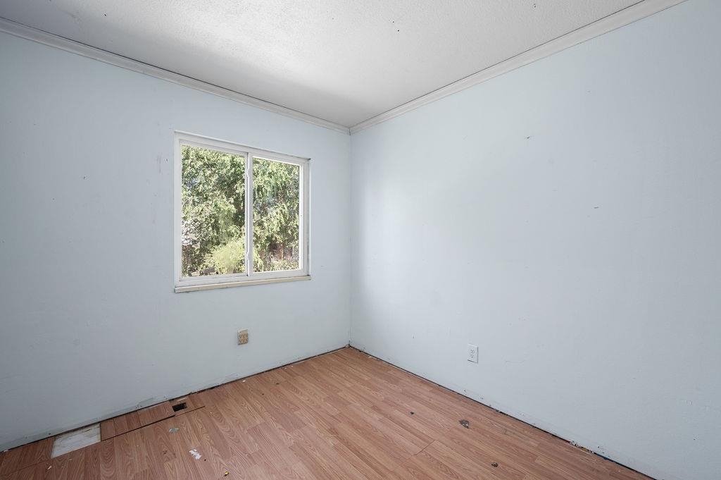 631-29 29 1/4 Road Grand Junction, CO 81504 - Photo 11 of 11 an empty room with wooden floor and window
