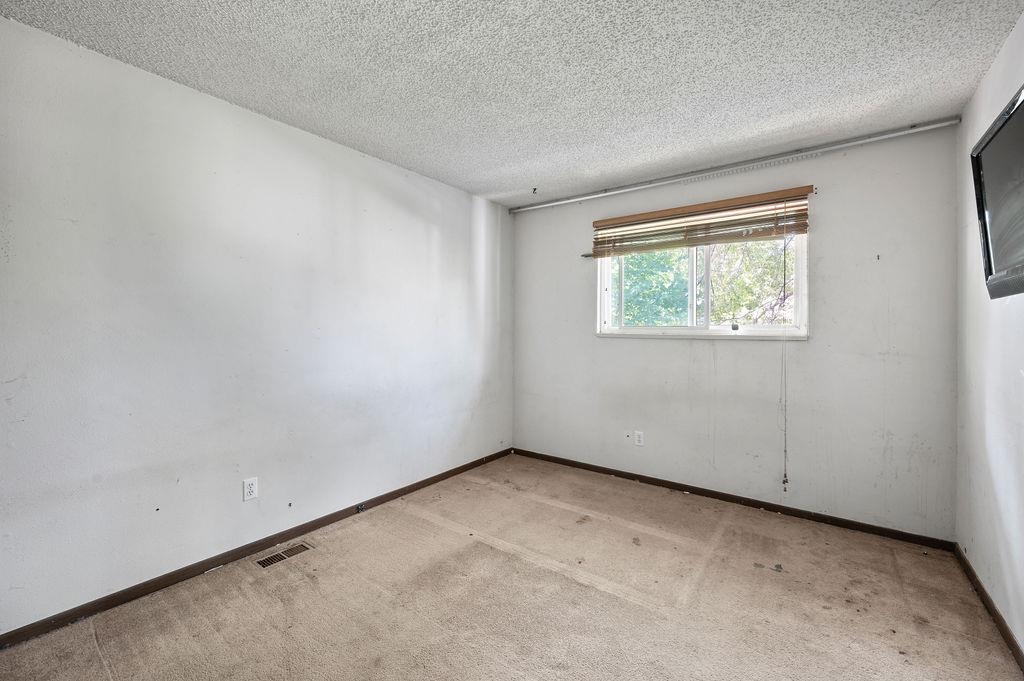 631-29 29 1/4 Road Grand Junction, CO 81504 - Photo 9 of 11 an empty room with windows
