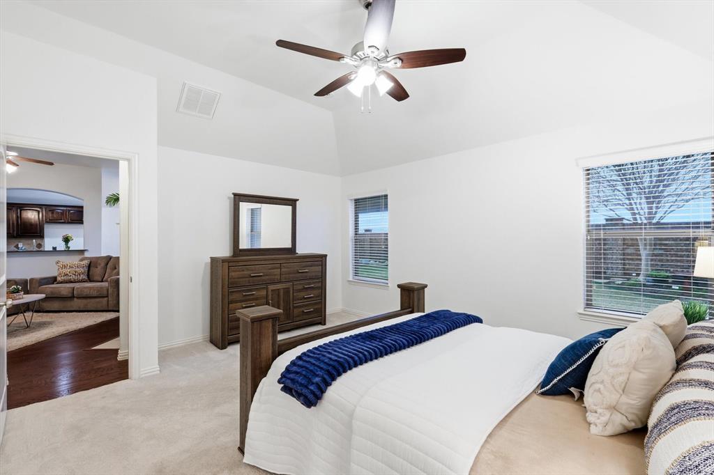 3818 Downing Drive Midlothian, TX 76065 - Photo 12 of 32 Bedroom with carpet floors, lofted ceiling, and a ceiling fan